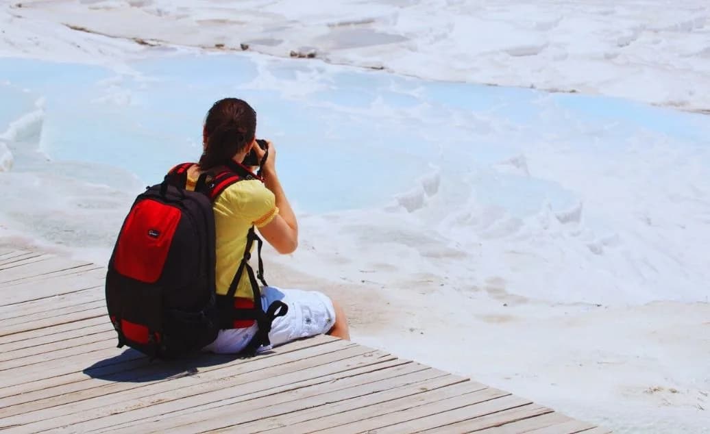 A traveller looking out over the Pamukkale travertines